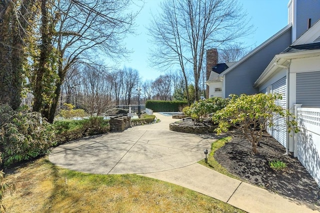 view of home's community featuring a patio