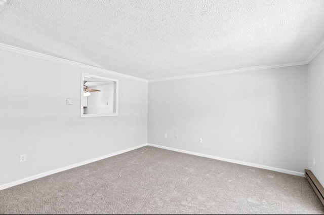 carpeted spare room featuring a textured ceiling, baseboard heating, ceiling fan, and crown molding