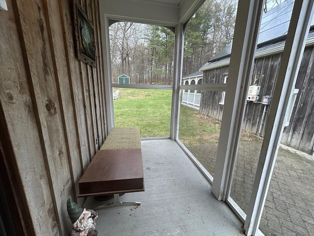 unfurnished sunroom featuring a healthy amount of sunlight