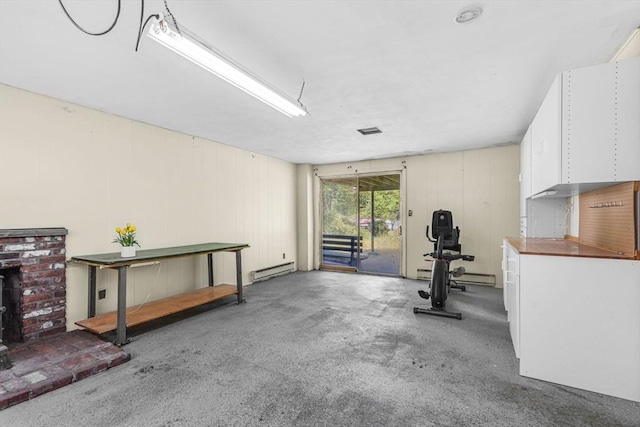 36 Fontaine St, Marlborough, MA 01752 - workout area featuring a baseboard radiator and wooden walls