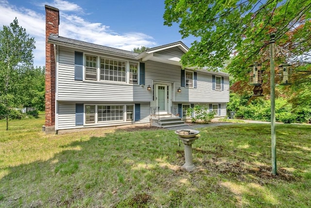 36 Fontaine St, Marlborough, MA 01752 - split foyer home featuring a chimney