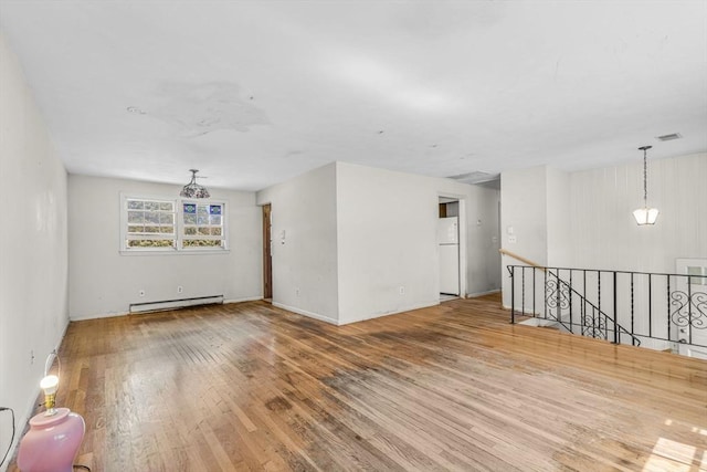 36 Fontaine St, Marlborough, MA 01752 - unfurnished room with baseboard heating and wood finished floors