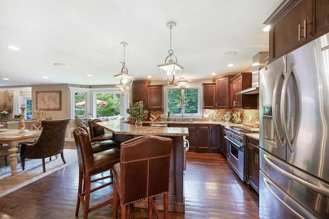 50 Elm St, Plympton, MA 02367 - kitchen with stainless steel appliances, healthy amount of natural light, wall chimney range hood, light stone countertops, and recessed lighting