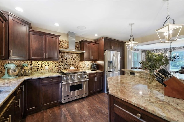 50 Elm St, Plympton, MA 02367 - kitchen with appliances with stainless steel finishes, wall chimney range hood, a chandelier, dark wood-style flooring, and light stone counters