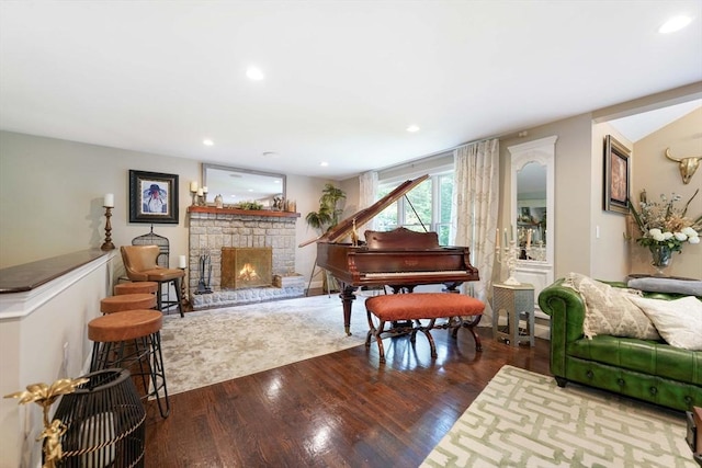 50 Elm St, Plympton, MA 02367 - living area with wood finished floors, a stone fireplace, and recessed lighting
