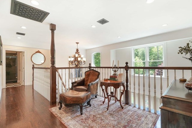50 Elm St, Plympton, MA 02367 - living area with wood finished floors, a chandelier, recessed lighting, and an upstairs landing