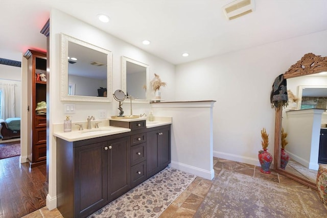 50 Elm St, Plympton, MA 02367 - bathroom featuring double vanity, ensuite bathroom, recessed lighting, and baseboards