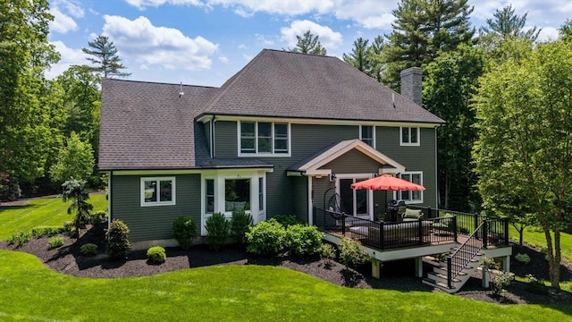 50 Elm St, Plympton, MA 02367 - back of house featuring a chimney, a deck, a lawn, and stairs