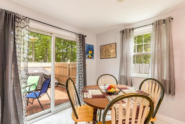 66 Captain Cook Ln Unit 66, Barnstable, MA 02632 - dining room featuring baseboards and tile patterned floors