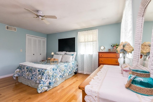 66 Captain Cook Ln Unit 66, Barnstable, MA 02632 - bedroom with wood finished floors, a closet, a ceiling fan, and baseboards