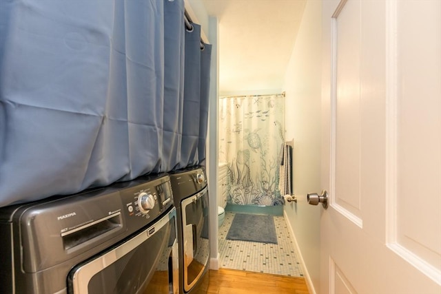 66 Captain Cook Ln Unit 66, Barnstable, MA 02632 - laundry area with baseboards