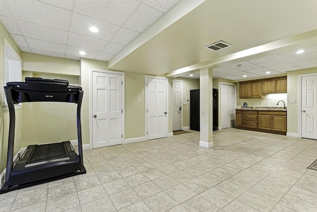 26 Waterville Ln, Shrewsbury, MA 01545 - exercise room with a paneled ceiling, a sink, recessed lighting, baseboards, and light tile patterned floors
