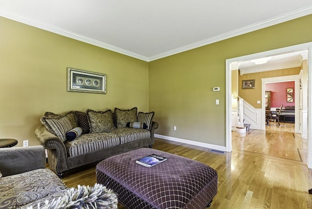 26 Waterville Ln, Shrewsbury, MA 01545 - living area featuring ornamental molding, wood finished floors, stairs, and baseboards