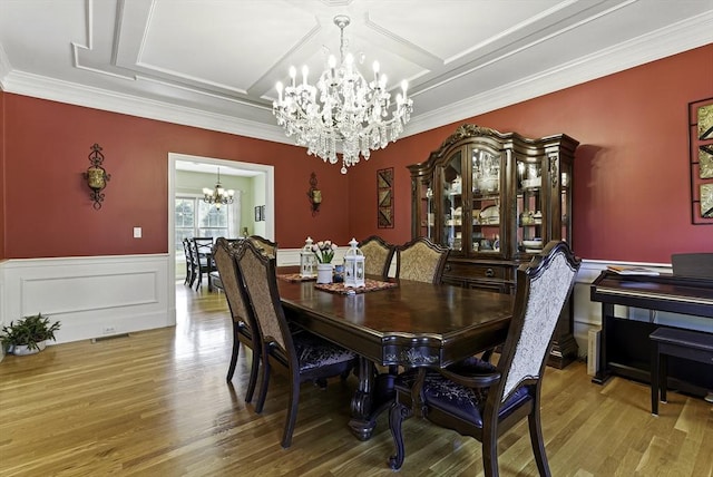 26 Waterville Ln, Shrewsbury, MA 01545 - dining room featuring a chandelier, ornamental molding, wood finished floors, wainscoting, and coffered ceiling