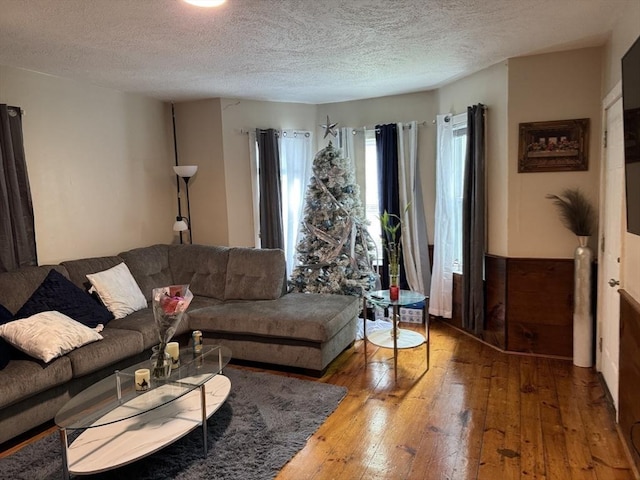 348 Fairmount St, Fitchburg, MA 01420 - living room with a textured ceiling and hardwood / wood-style floors