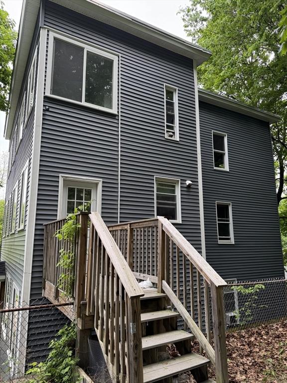 348 Fairmount St, Fitchburg, MA 01420 - back of house featuring stairway and a deck