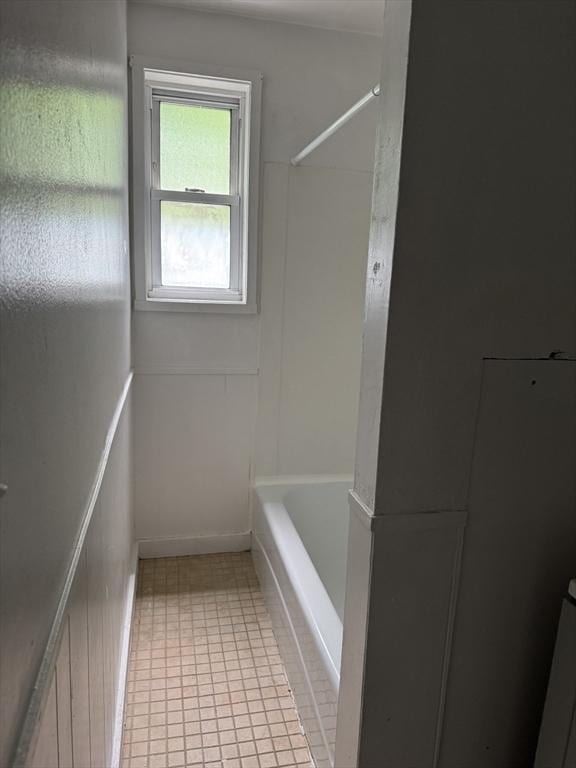 348 Fairmount St, Fitchburg, MA 01420 - bathroom featuring tile patterned flooring, a bath, and a shower