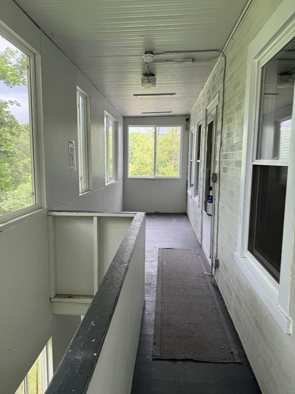348 Fairmount St, Fitchburg, MA 01420 - unfurnished sunroom featuring healthy amount of natural light