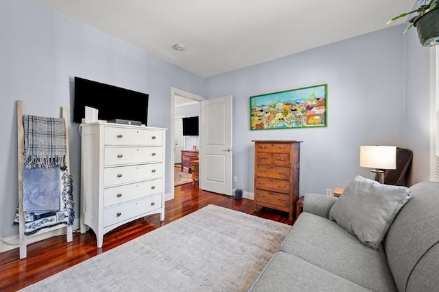 bedroom featuring dark wood-type flooring