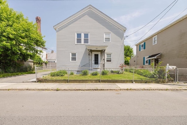 20 Wilcox St, Fall River, MA 02724 - view of front facade featuring a fenced front yard