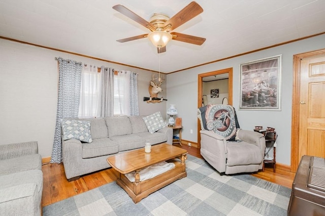 20 Wilcox St, Fall River, MA 02724 - living area with ornamental molding, ceiling fan, wood finished floors, and baseboards