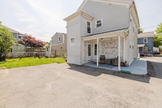 20 Wilcox St, Fall River, MA 02724 - back of house featuring a patio