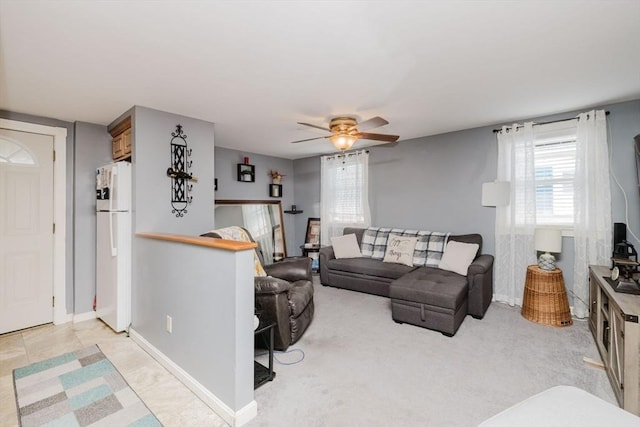 20 Wilcox St, Fall River, MA 02724 - living area featuring ceiling fan and baseboards
