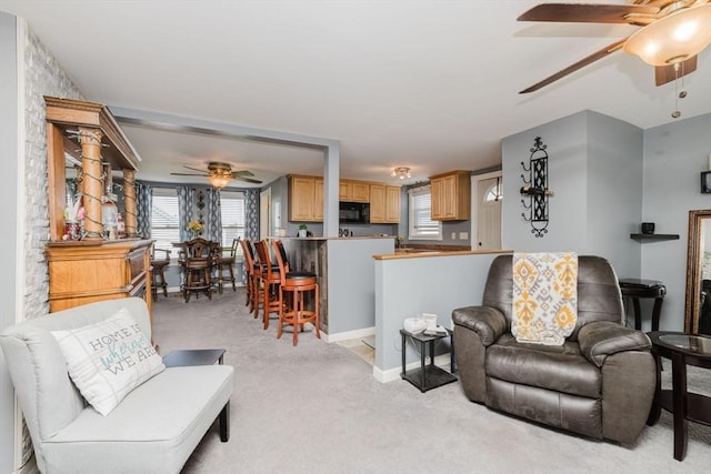 20 Wilcox St, Fall River, MA 02724 - living room featuring ceiling fan, light colored carpet, and baseboards