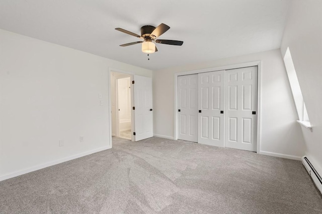20 Washington St Unit 15, Easton, MA 02356 - unfurnished bedroom featuring a baseboard heating unit, carpet flooring, baseboards, and ceiling fan