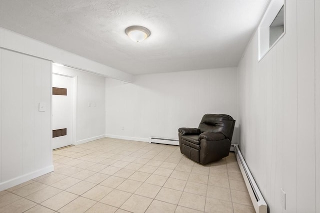 20 Washington St Unit 15, Easton, MA 02356 - unfurnished room with a baseboard heating unit, baseboards, and light tile patterned floors