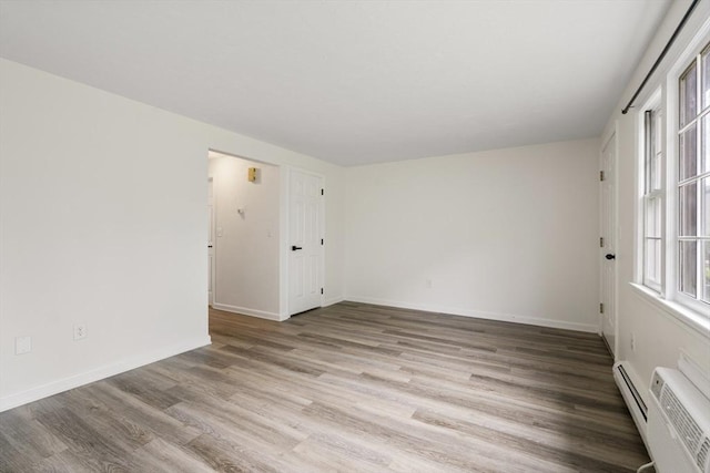 20 Washington St Unit 15, Easton, MA 02356 - spare room with light wood-type flooring and baseboards