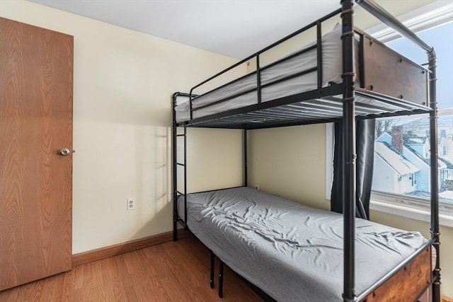 bedroom with wood-type flooring