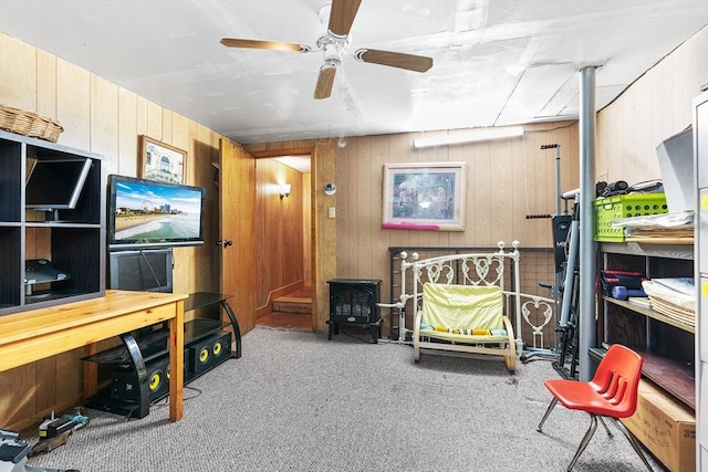 playroom with light carpet and ceiling fan