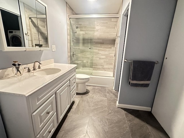 158 Quincy Shore Dr Unit 78, Quincy, MA 02171 - bathroom with washer / dryer, vanity, enclosed tub / shower combo, and marble finish flooring