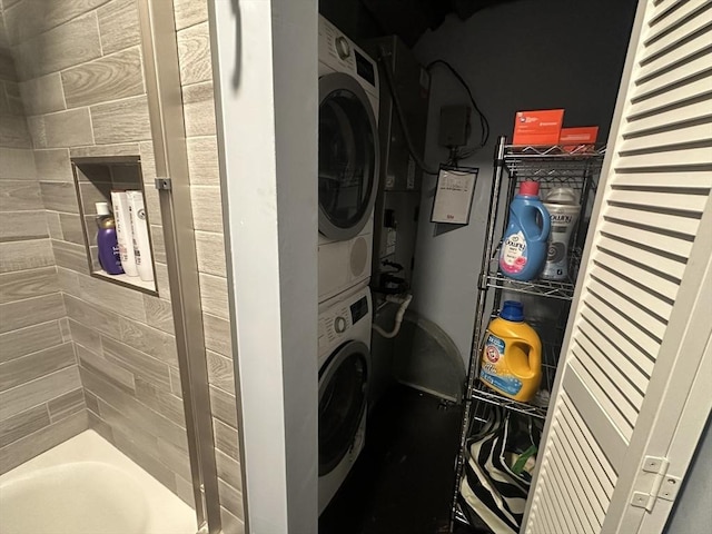 158 Quincy Shore Dr Unit 78, Quincy, MA 02171 - laundry area featuring stacked washing machine and dryer