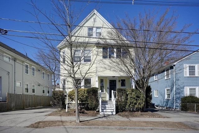 view of front of property with fence