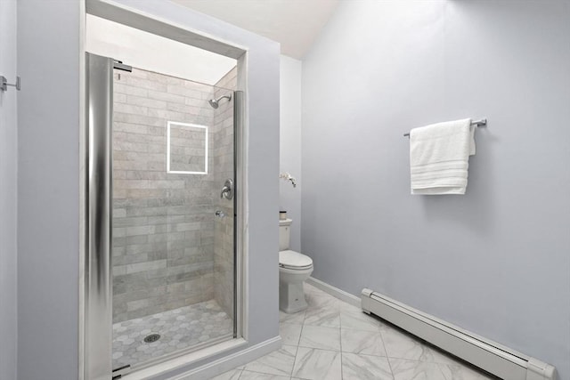 bathroom featuring walk in shower, toilet, and a baseboard heating unit