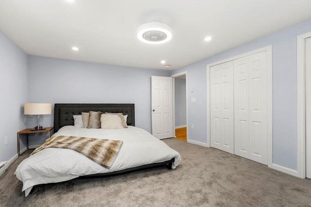 carpeted bedroom with a closet