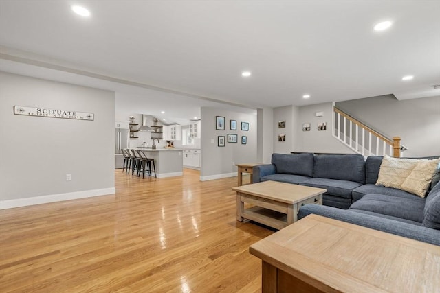 85 Mann Hill Rd, Scituate, MA 02066 - living area with recessed lighting, light wood finished floors, and stairway