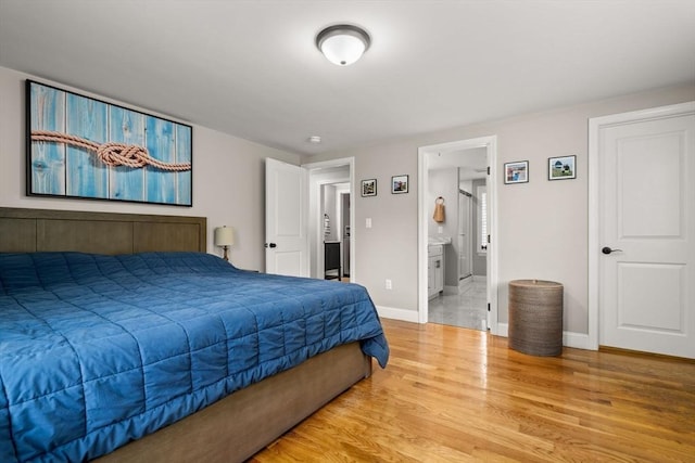 85 Mann Hill Rd, Scituate, MA 02066 - bedroom featuring light wood-style flooring and ensuite bathroom