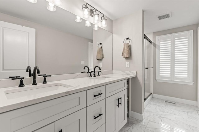 85 Mann Hill Rd, Scituate, MA 02066 - full bathroom with marble finish flooring, a shower stall, and double vanity