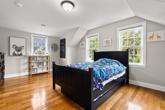 85 Mann Hill Rd, Scituate, MA 02066 - bedroom with lofted ceiling and wood finished floors