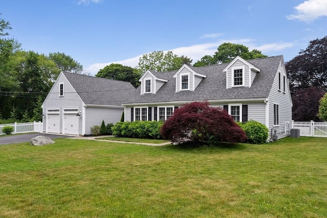 85 Mann Hill Rd, Scituate, MA 02066 - cape cod home featuring a garage, a shingled roof, and driveway