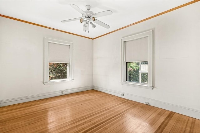 68 Barnard Ave, Watertown, MA 02472 - unfurnished room featuring light wood finished floors, ornamental molding, and a ceiling fan