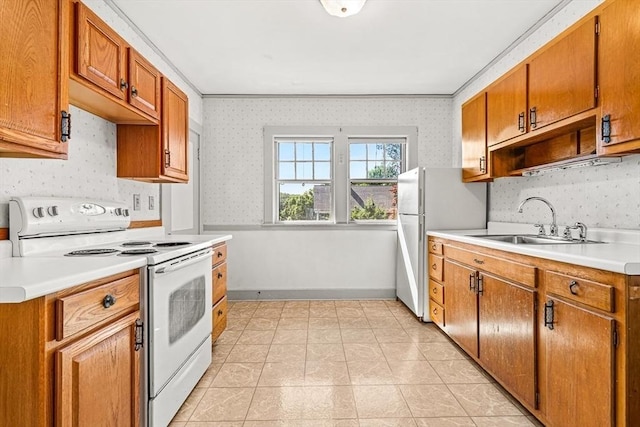 68 Barnard Ave, Watertown, MA 02472 - kitchen with white appliances, wallpapered walls, light countertops, brown cabinets, and ornamental molding