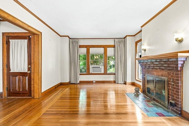 68 Barnard Ave, Watertown, MA 02472 - unfurnished living room with hardwood / wood-style floors, ornamental molding, cooling unit, and a fireplace