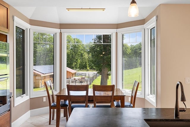 19 Hardscrabble Rd, Sterling, MA 01564 - dining area with light tile patterned floors and vaulted ceiling