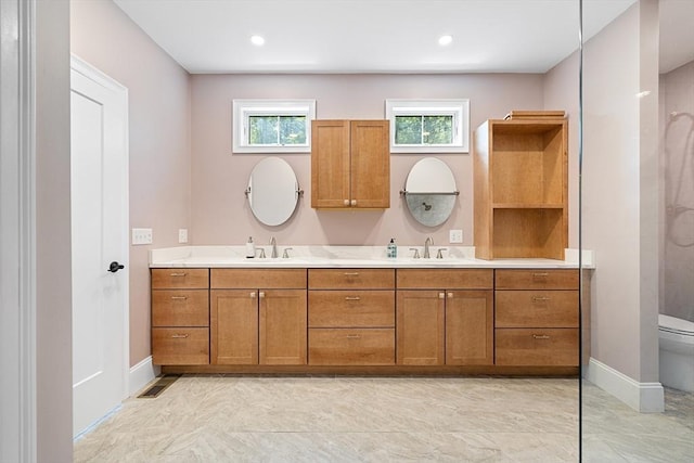 19 Hardscrabble Rd, Sterling, MA 01564 - bathroom with double vanity and toilet