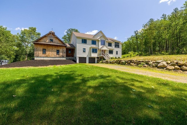 19 Hardscrabble Rd, Sterling, MA 01564 - view of front of home featuring a garage, dirt driveway, and a front lawn