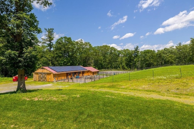 19 Hardscrabble Rd, Sterling, MA 01564 - view of yard with an exterior structure, an outbuilding, a view of countryside, and a wooded view